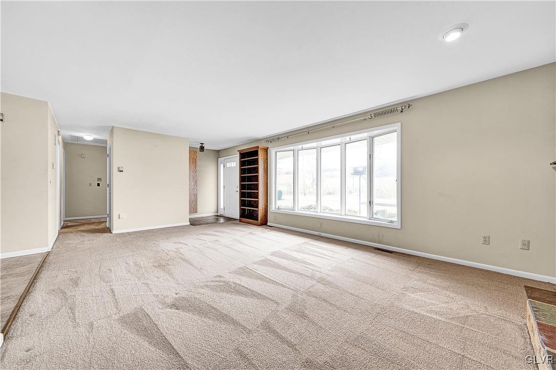 5651 Park Valley Road Schnecksville, PA 18078 - Photo 5 of 32 a view of an empty room with a window