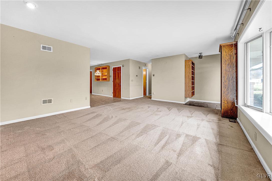 5651 Park Valley Road Schnecksville, PA 18078 - Photo 6 of 32 a view of an empty room with a window