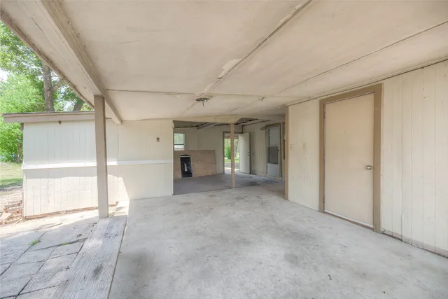 a view of a big room with large windows