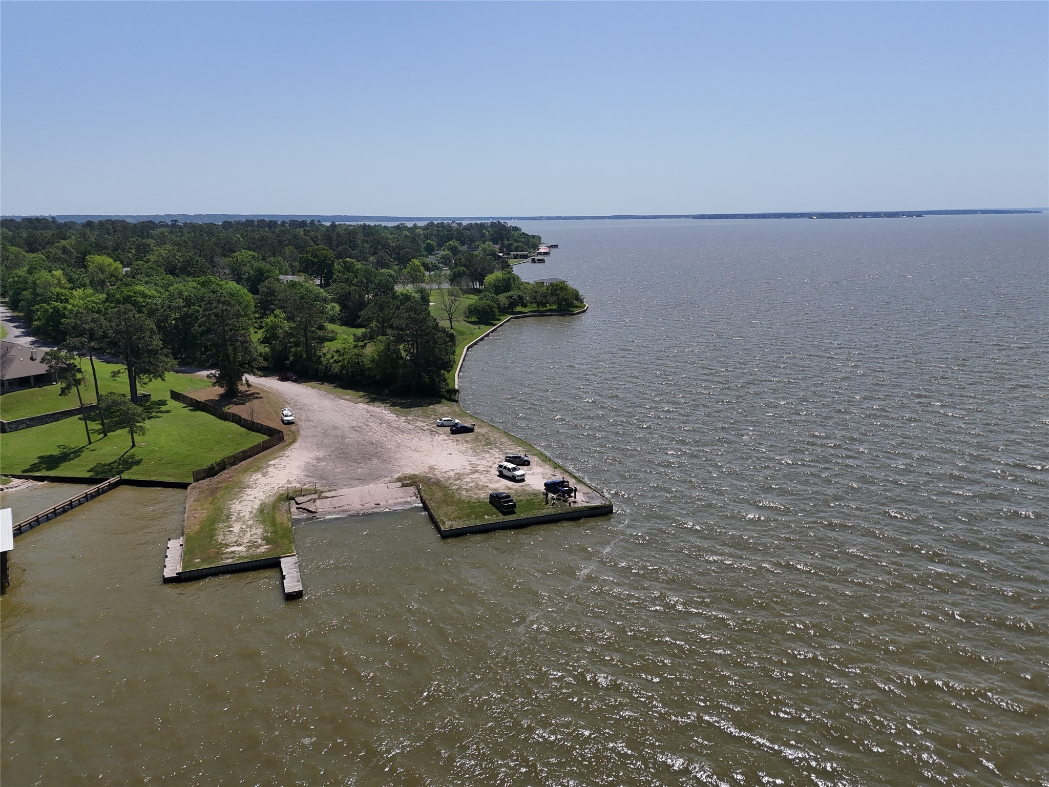 305 Oak Ridge Drive Onalaska, TX 77360 - Photo 29 of 29 an aerial view of a tennis court
