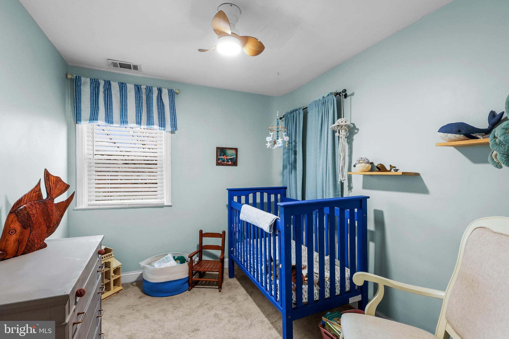 1020 Dartmouth Road Baltimore, MD 21212 - Photo 22 of 46 a bedroom with furniture and a window