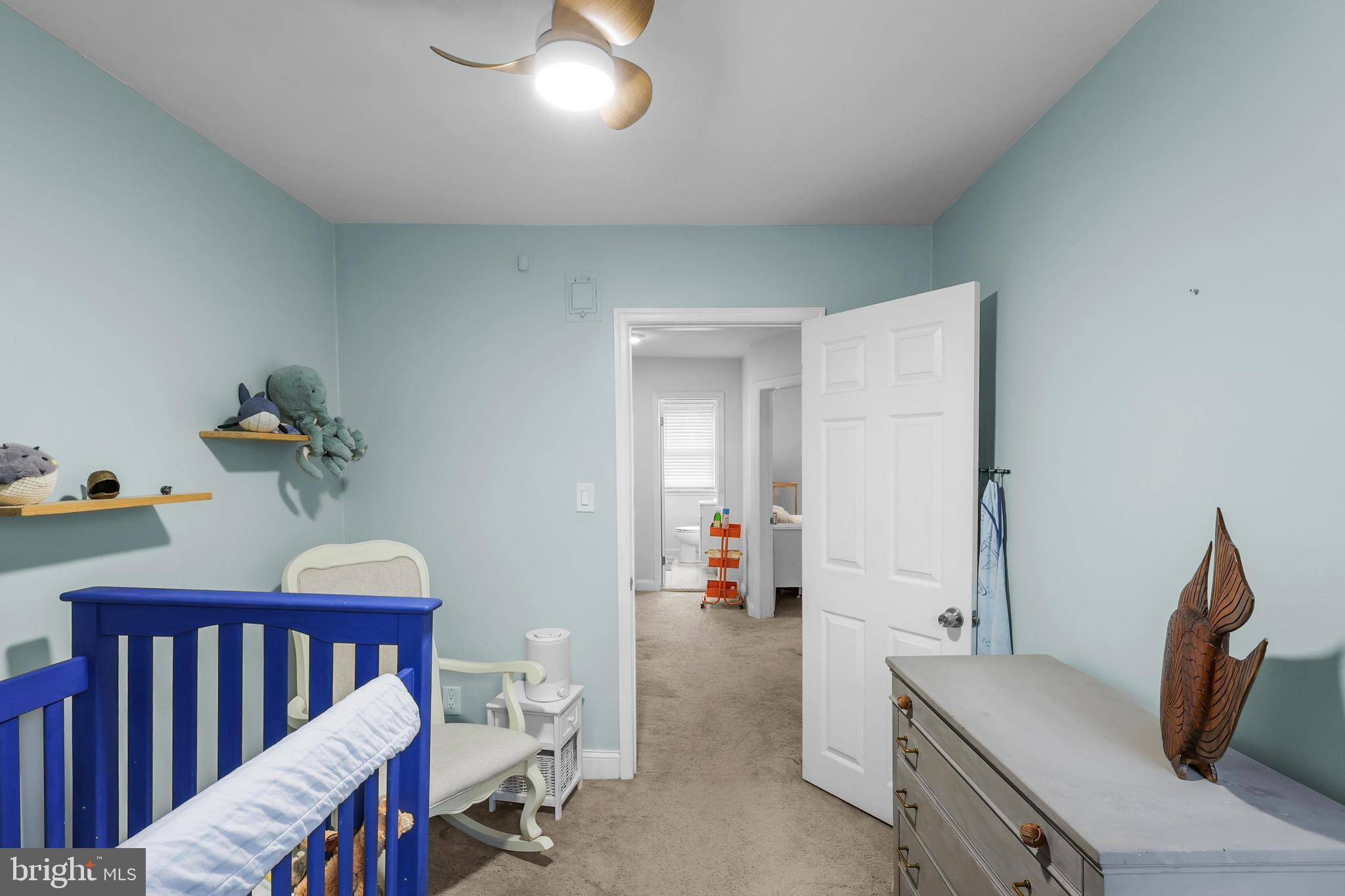 1020 Dartmouth Road Baltimore, MD 21212 - Photo 23 of 46 a bedroom with furniture and a wooden floor