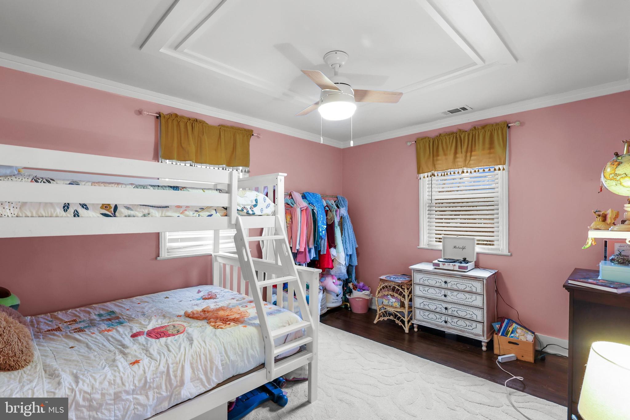 1020 Dartmouth Road Baltimore, MD 21212 - Photo 24 of 46 a bedroom with a bed and a tv