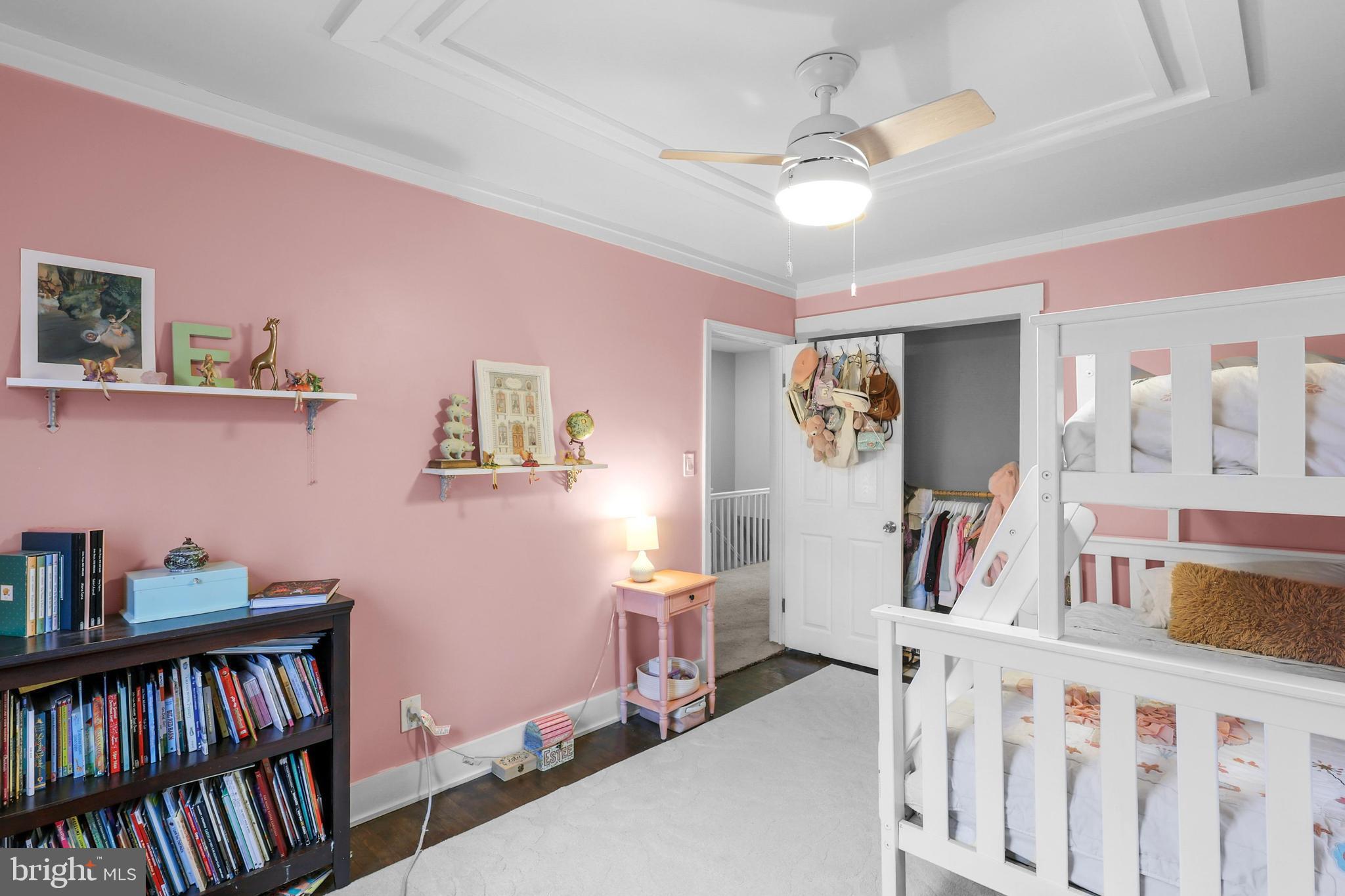 1020 Dartmouth Road Baltimore, MD 21212 - Photo 26 of 46 a bedroom with furniture and book shelf
