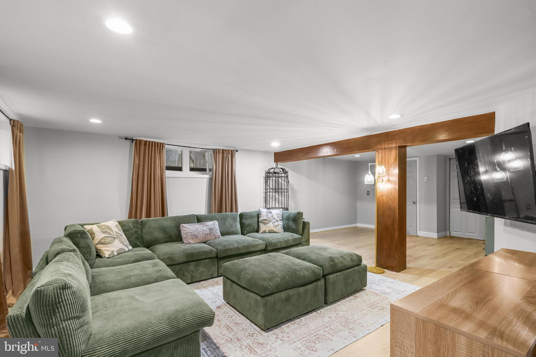1020 Dartmouth Road Baltimore, MD 21212 - Photo 33 of 46 a living room with furniture and a flat screen tv