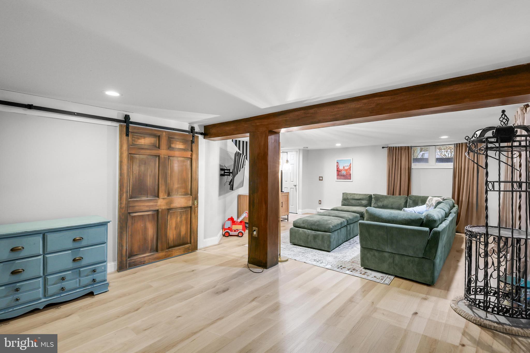 1020 Dartmouth Road Baltimore, MD 21212 - Photo 34 of 46 a living room with furniture and a flat screen tv