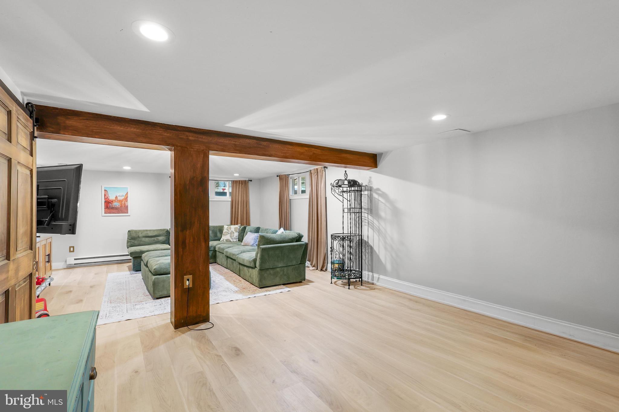 1020 Dartmouth Road Baltimore, MD 21212 - Photo 35 of 46 a view of livingroom with furniture and floor to ceiling window