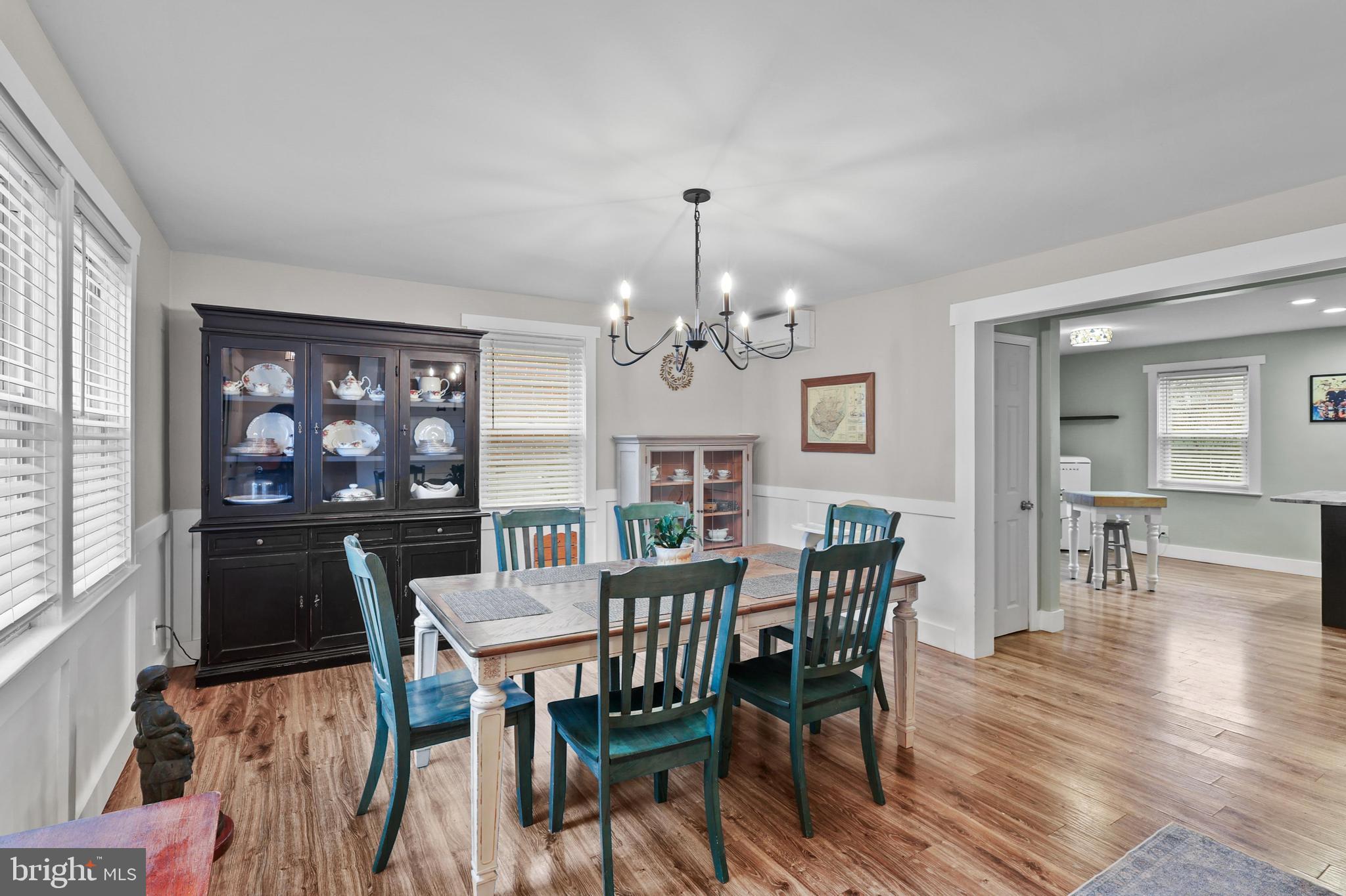 1020 Dartmouth Road Baltimore, MD 21212 - Photo 5 of 46 a view of a dining room with furniture window and wooden floor