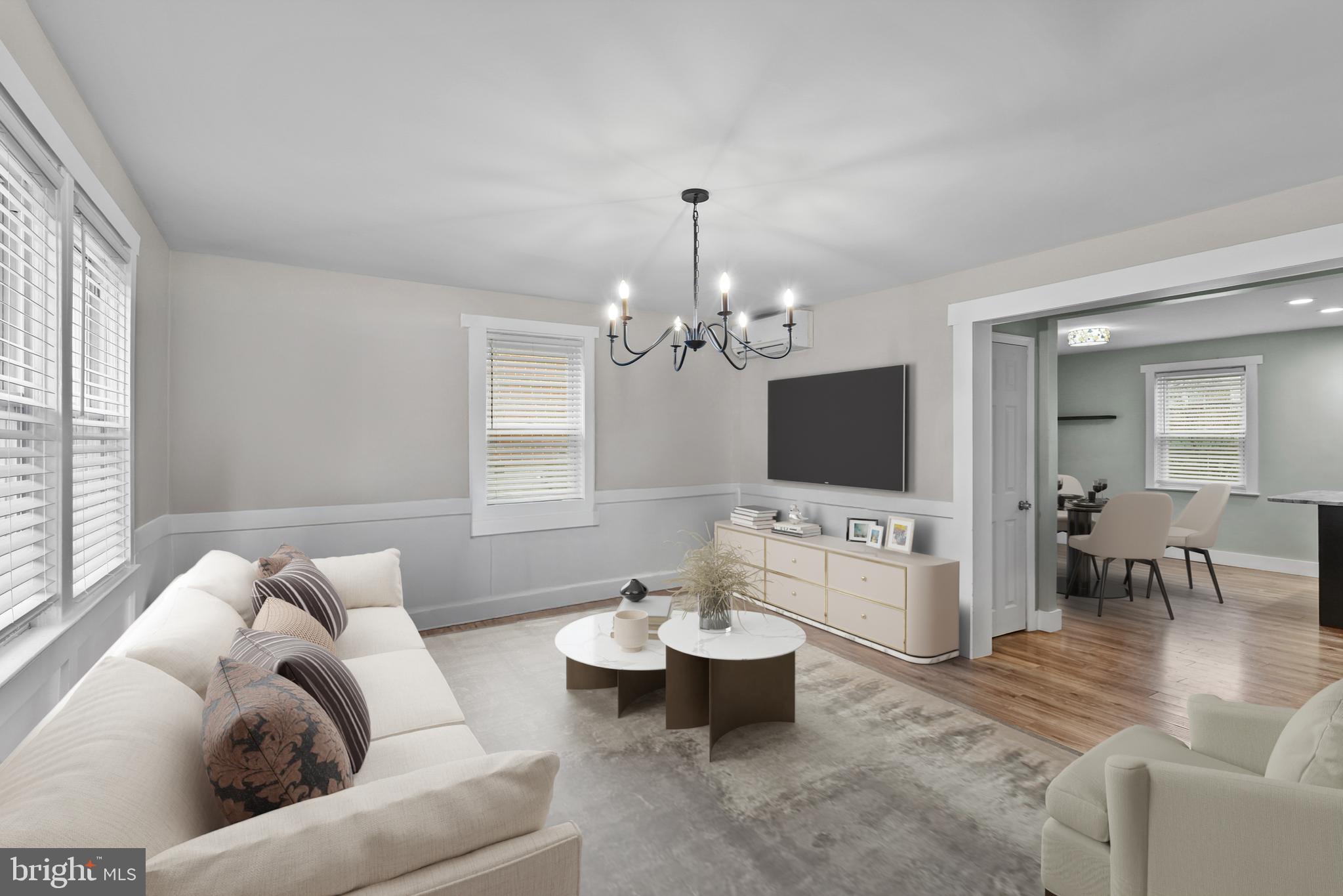 1020 Dartmouth Road Baltimore, MD 21212 - Photo 6 of 46 a living room with furniture chandelier and a window