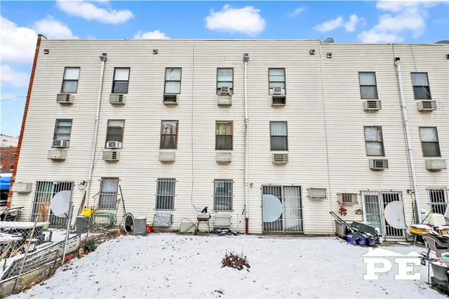 a front view of a building with street view