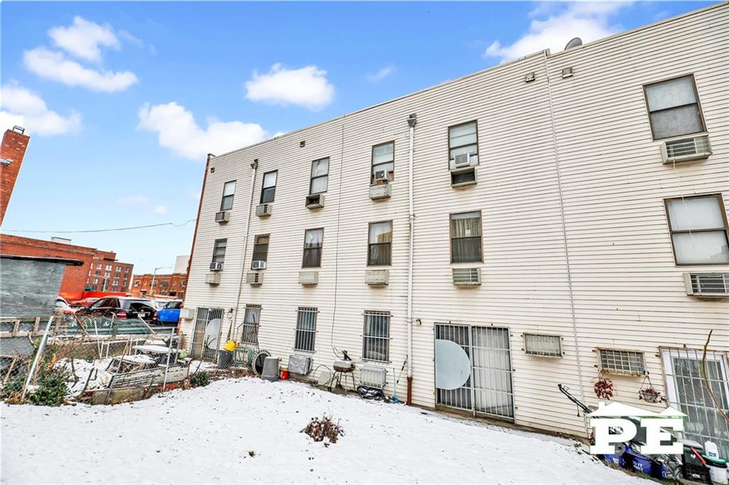 49 Erasmus Street, Unit 1A Brooklyn, NY 11226 - Photo 26 of 29 a front view of a building with street view