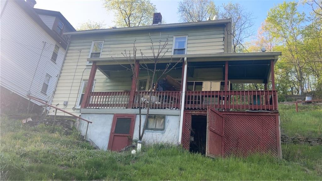 325 15th Street Donora, PA 15033 - Photo 4 of 8 front view of a house with a porch