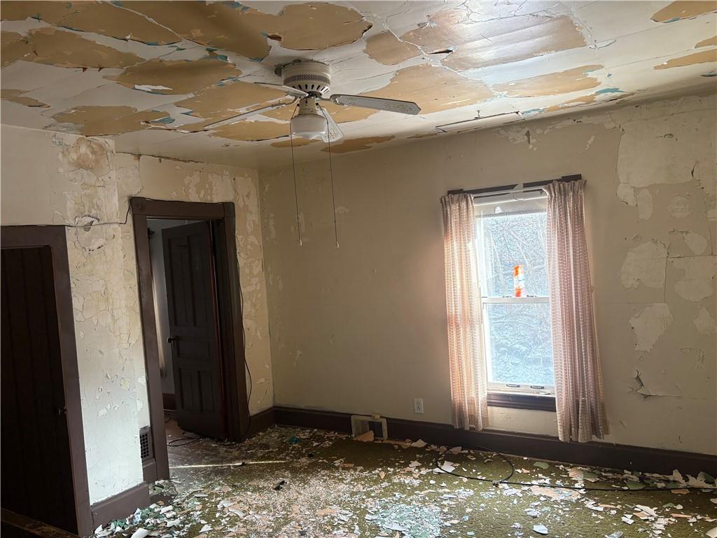 325 15th Street Donora, PA 15033 - Photo 5 of 8 a view of a bathroom with a sink and a window