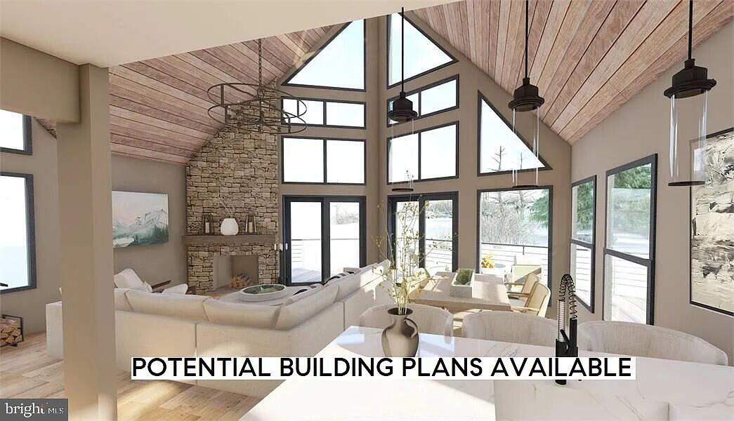 Lot 2 Tamarack Terrace Pocono Summit, PA 18346 - Photo 5 of 8 a view of open kitchen with granite countertop a couch