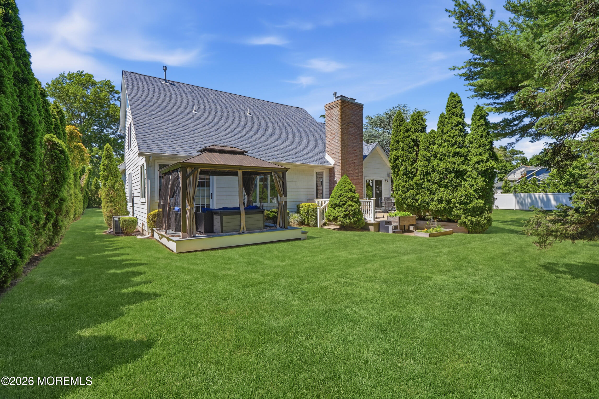 478 Rickey Lane Long Branch, NJ 07740 - Photo 62 of 64 a view of house in front of a big yard with large trees