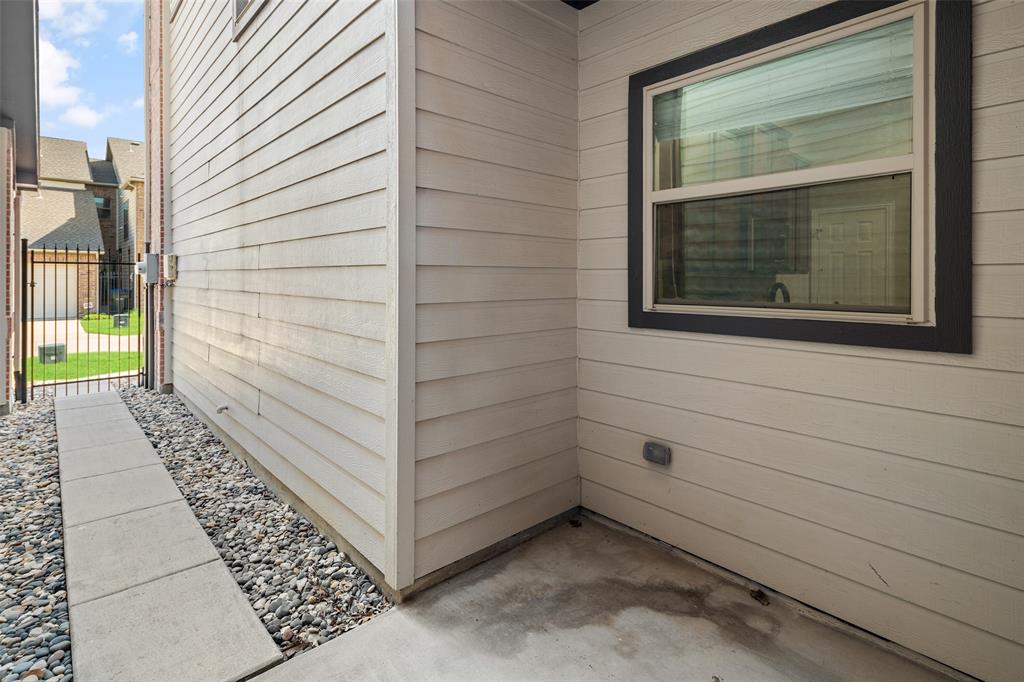 4245 Swan Forest Drive, Unit B Carrollton, TX 75010 - Photo 21 of 26 View of side of home