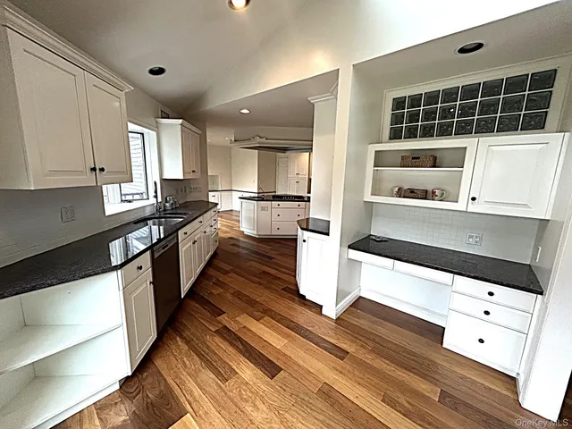 a large kitchen with cabinets