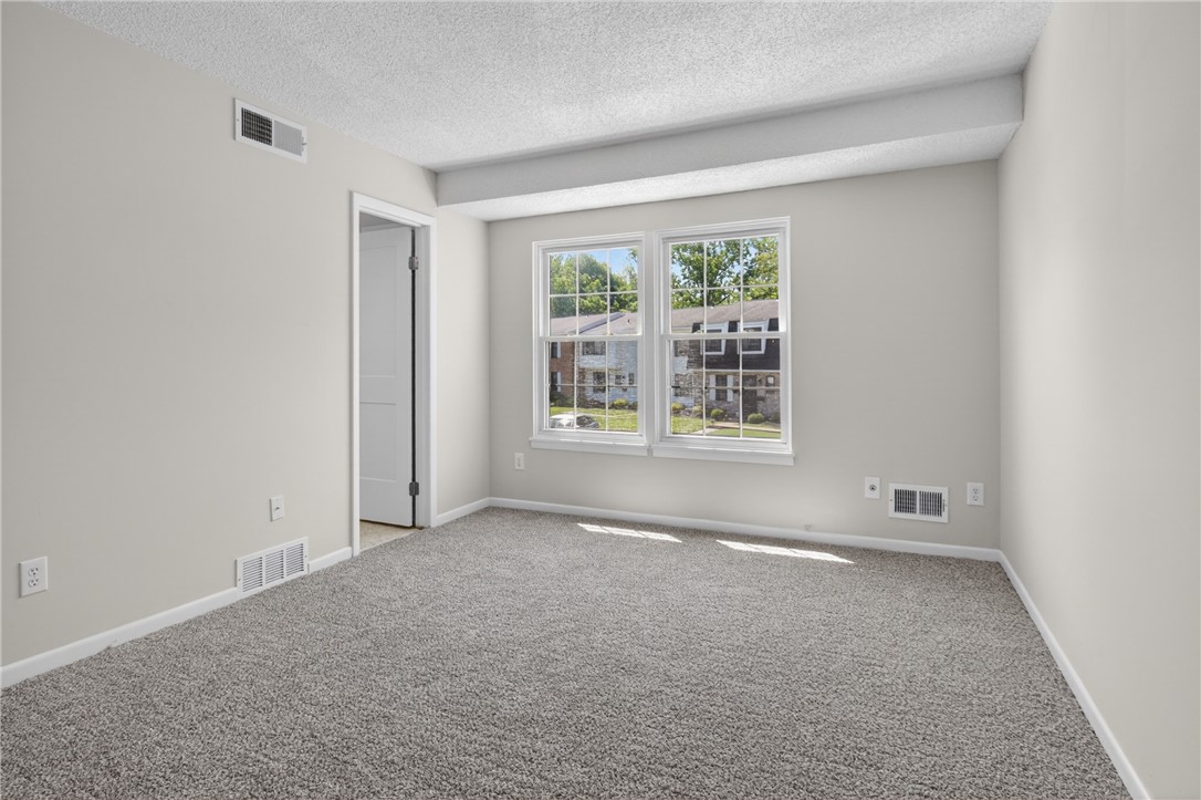 561 French Road Brighton, NY 14618 - Photo 20 of 45 PRIMARY SPACIOUS BEDROOM W/ ENTRY INTO THE MAIN BA