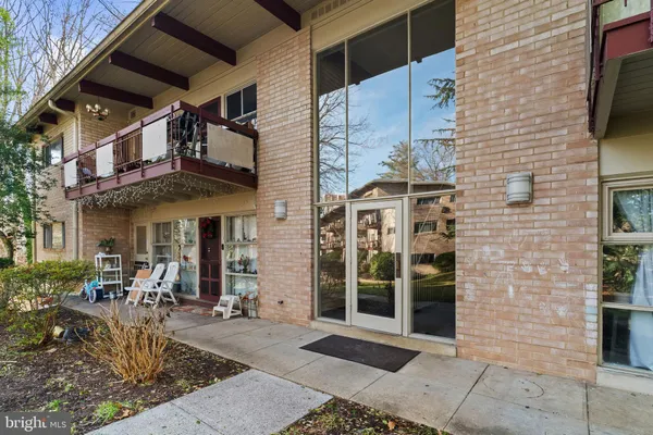 a view of a building with sitting area