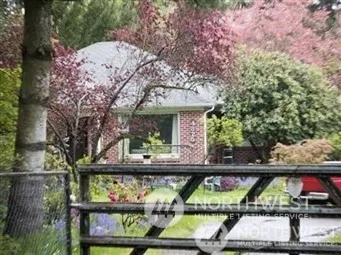 a view of swimming pool with a patio