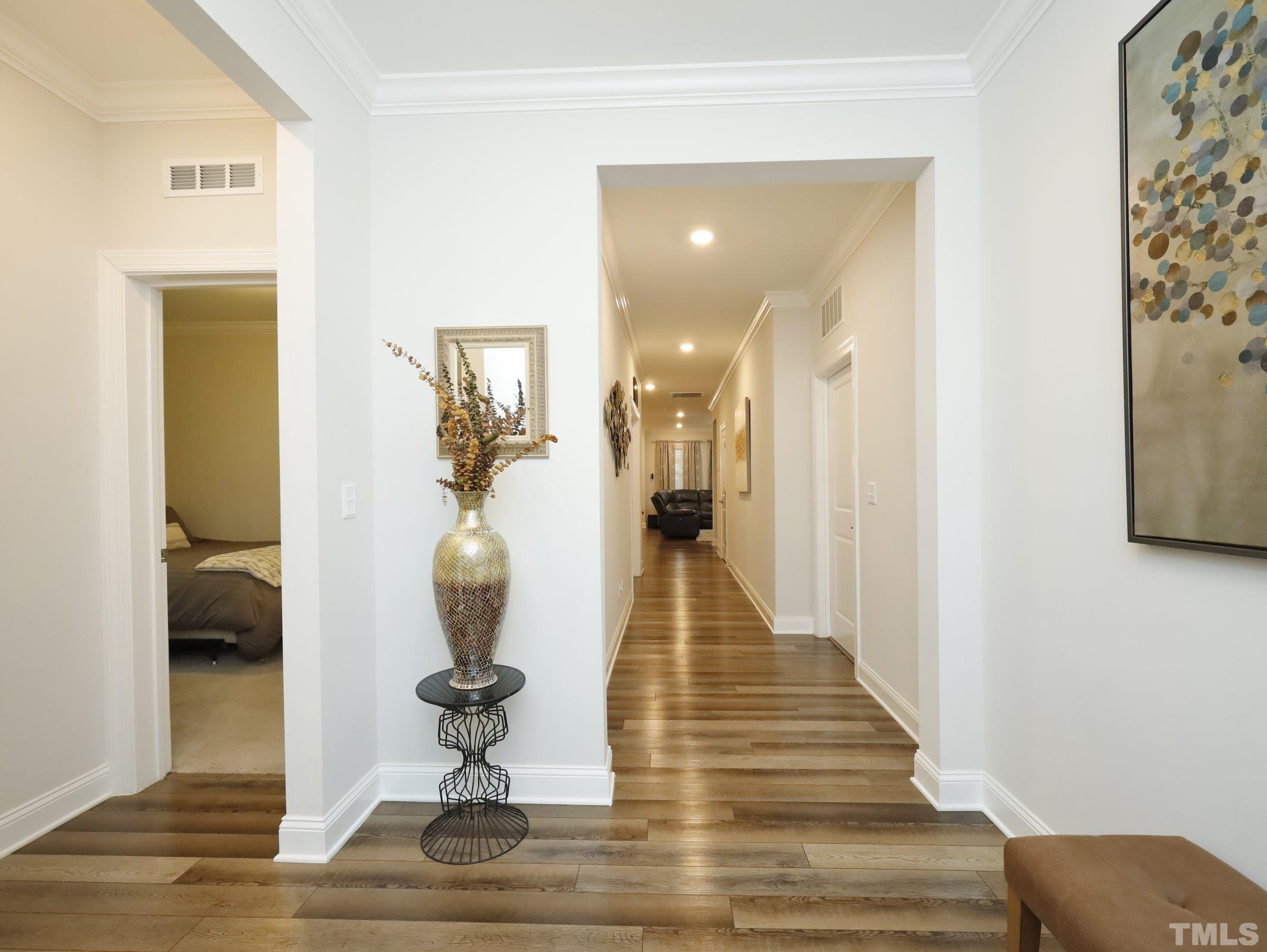162 Ivory Lane Raleigh, NC 27610 - Photo 3 of 35 a room with view of living room and wooden floor
