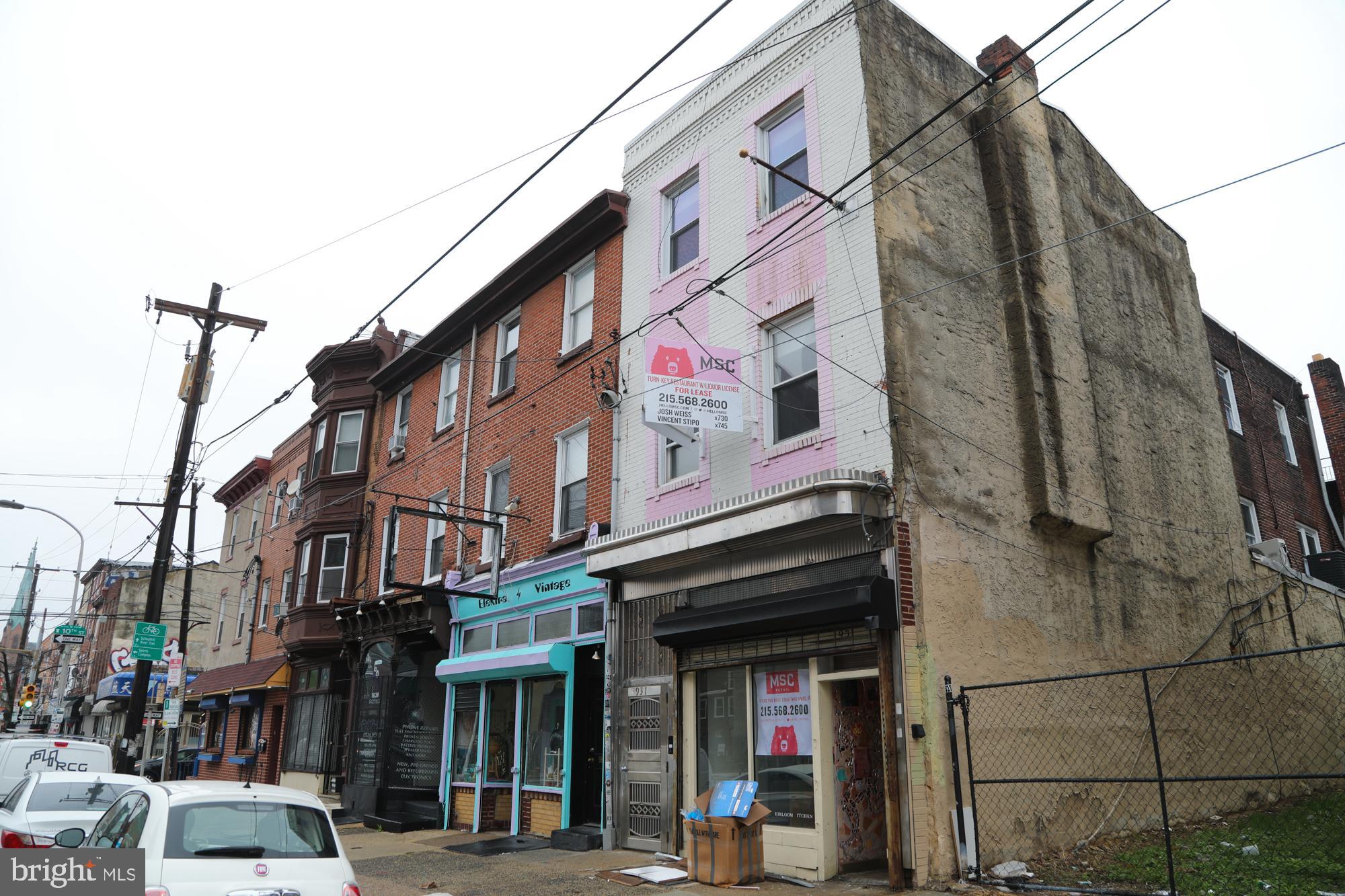 931 Spring Garden Street, Unit 2 Philadelphia, PA 19123 - Photo 19 of 24 a view of a building with street