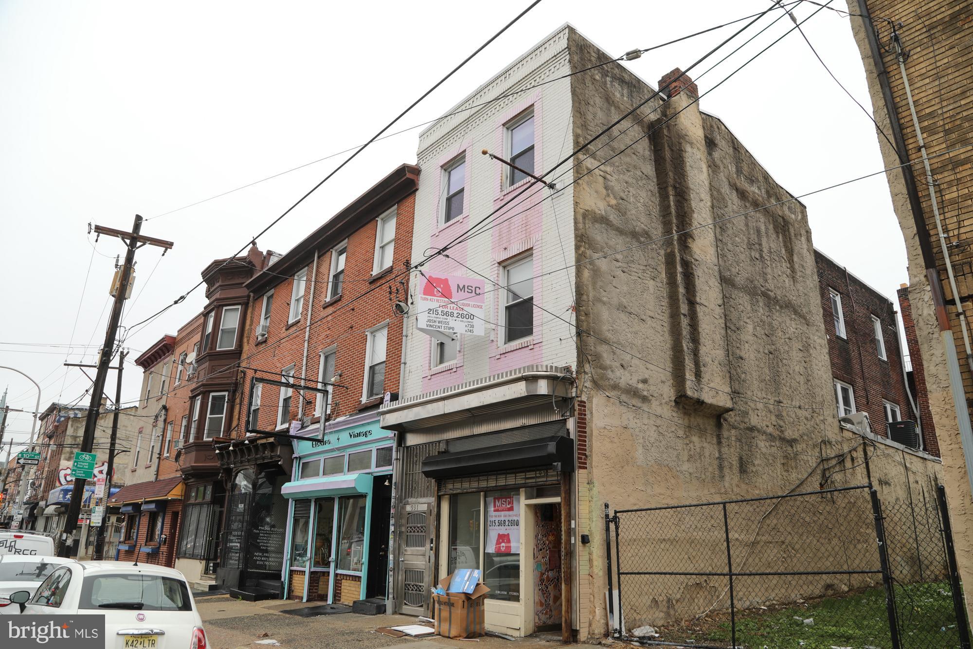 931 Spring Garden Street, Unit 2 Philadelphia, PA 19123 - Photo 21 of 24 a view of a building with a street