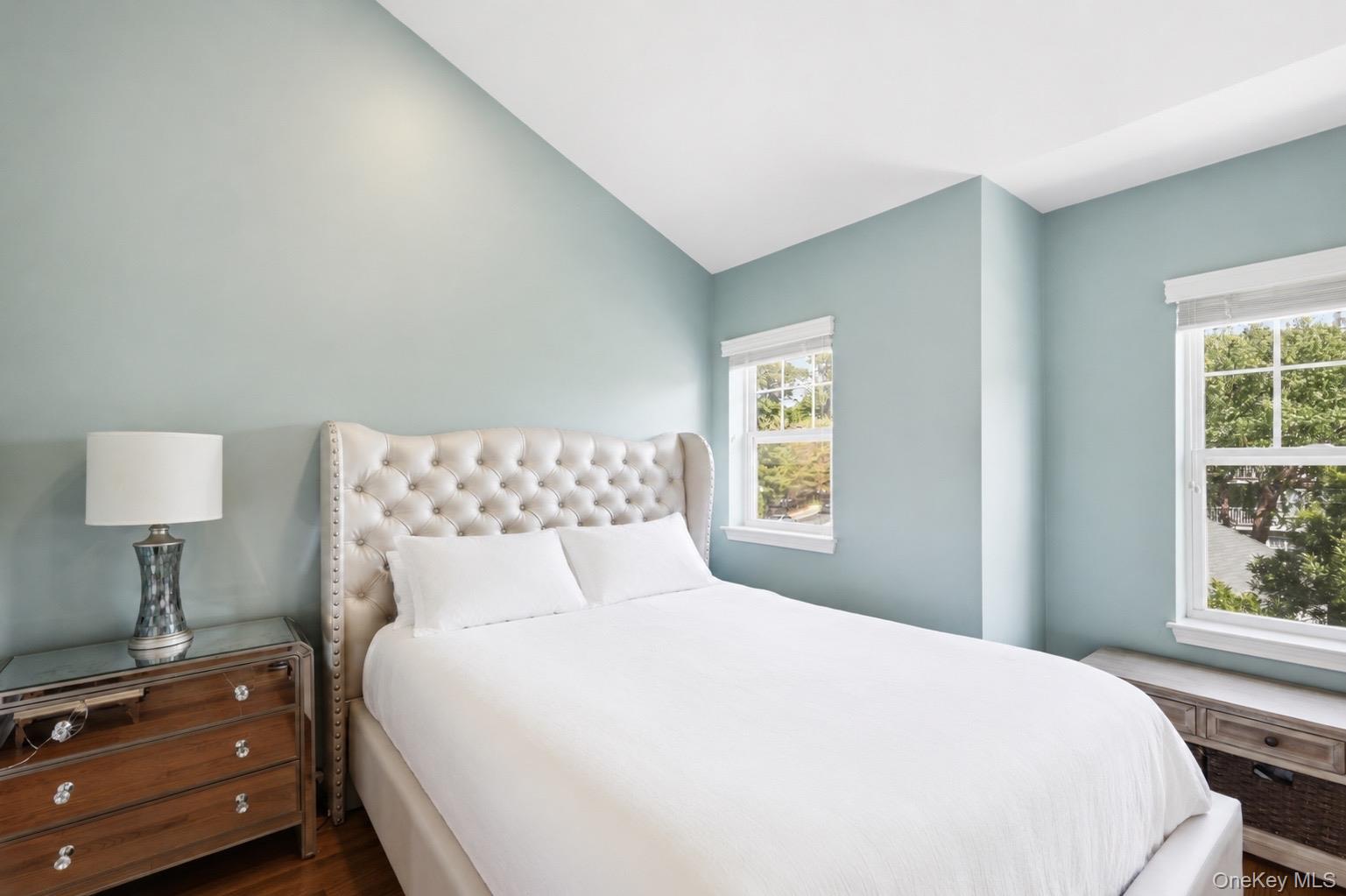 323 Waterside Close Peekskill, NY 10566 - Photo 20 of 42 2nd bedroom with vaulted ceiling, new recessed lights, and two windows.