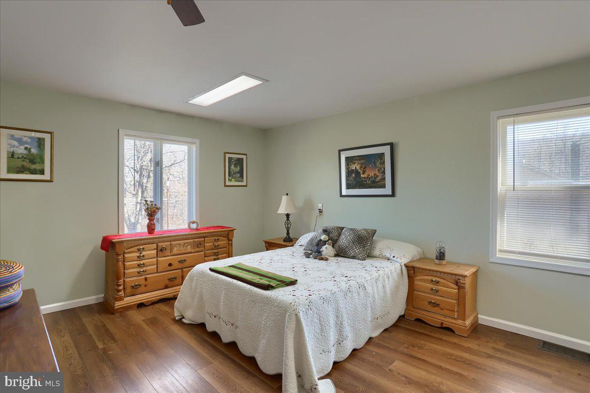 75 Thunder Trail Fairfield, PA 17320 - Photo 22 of 64 a bedroom with a bed and wooden floor