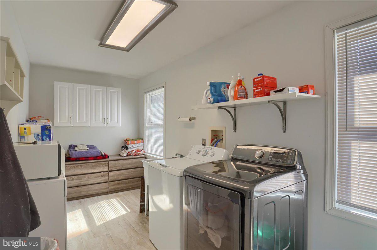 75 Thunder Trail Fairfield, PA 17320 - Photo 25 of 64 a utility room with a window dryer and washer