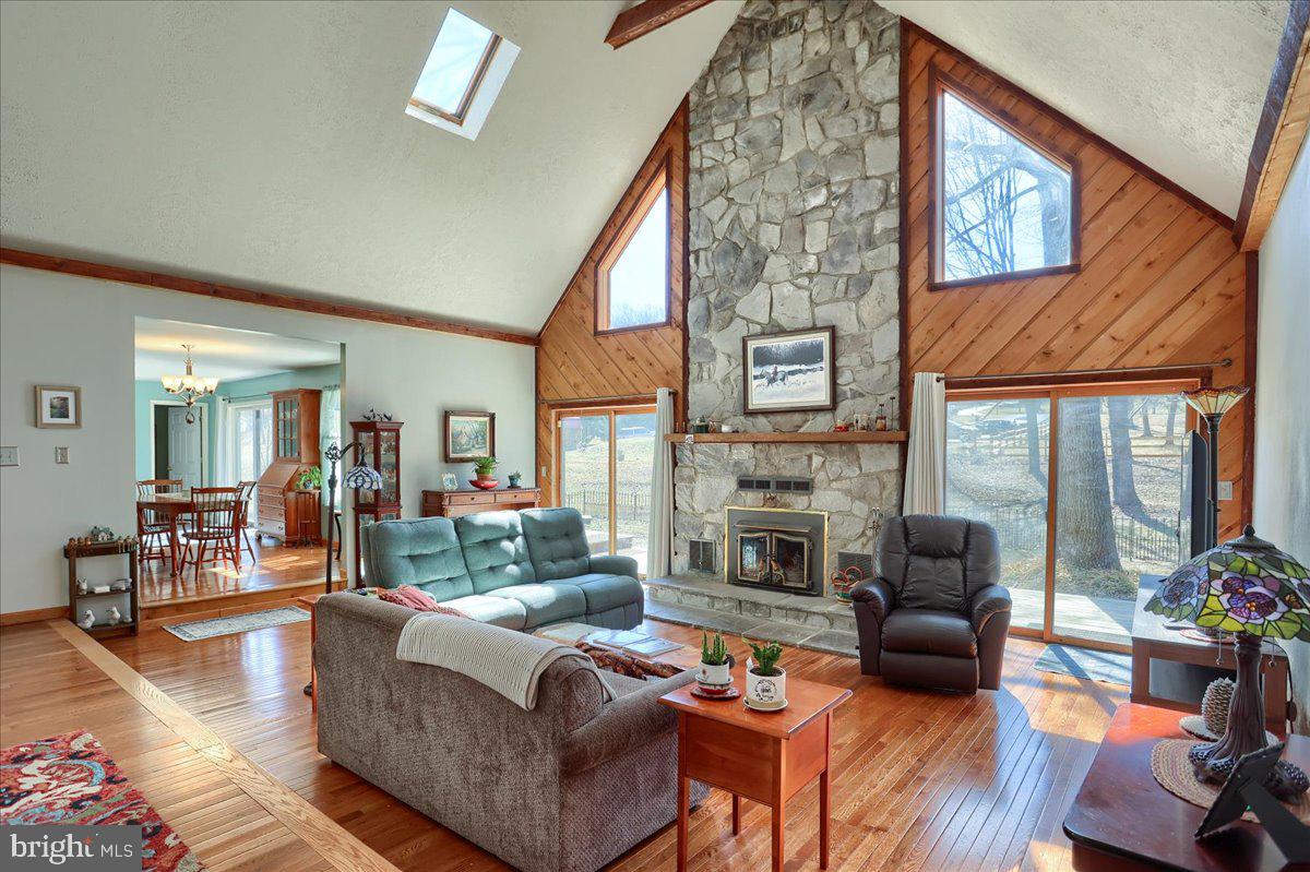 75 Thunder Trail Fairfield, PA 17320 - Photo 27 of 64 a living room with fireplace furniture and a large window