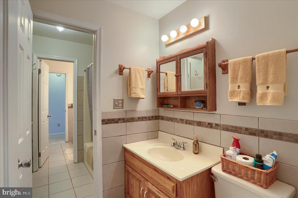 75 Thunder Trail Fairfield, PA 17320 - Photo 41 of 64 a bathroom with a sink and a mirror