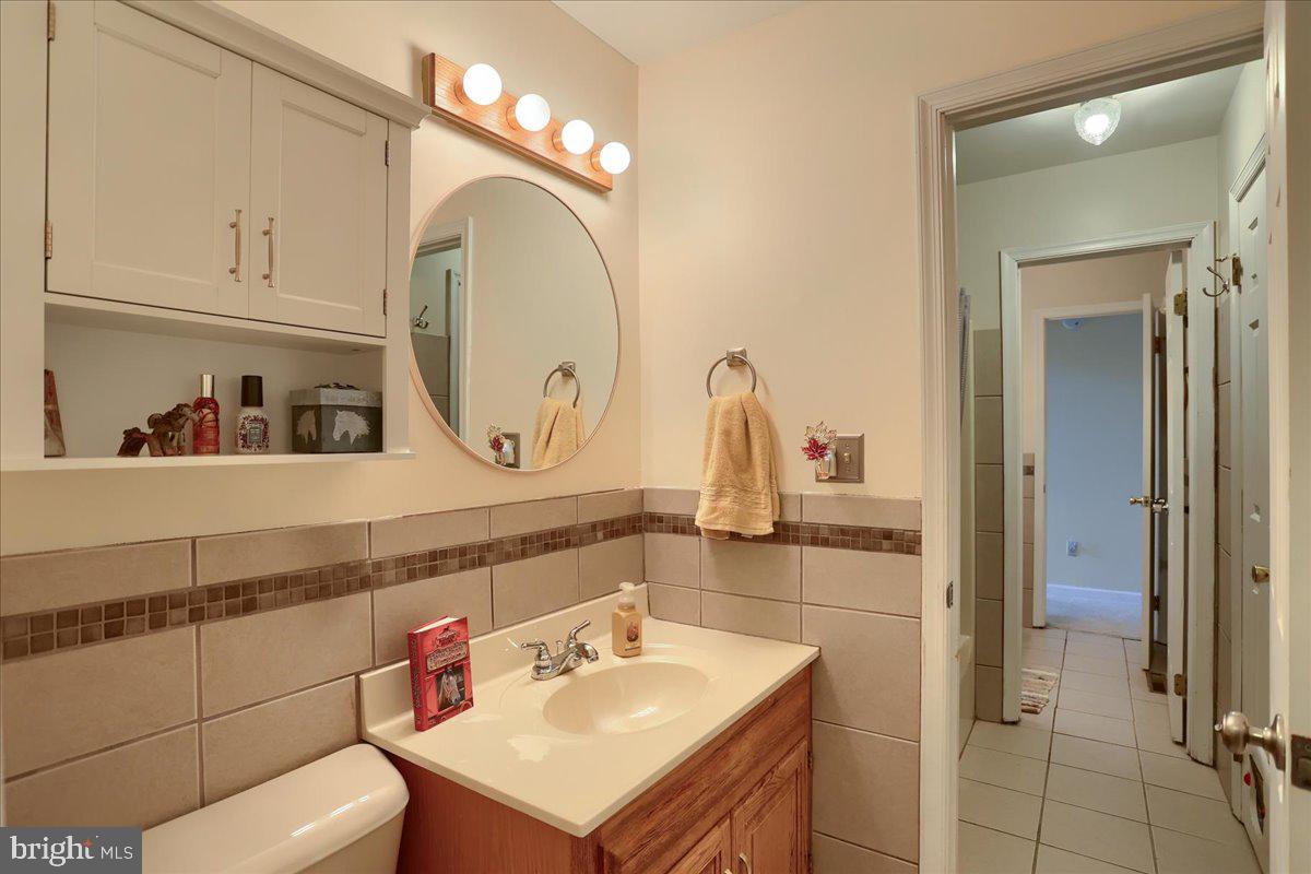 75 Thunder Trail Fairfield, PA 17320 - Photo 42 of 64 a bathroom with a sink and a mirror