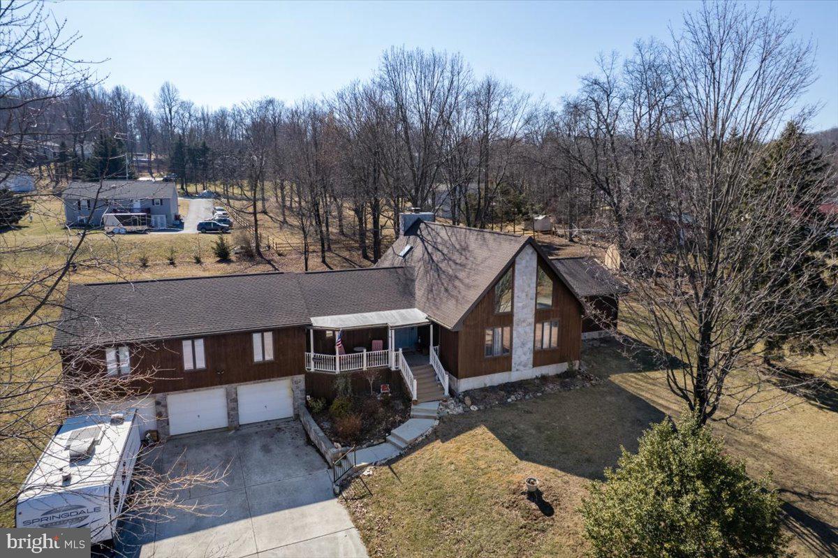 75 Thunder Trail Fairfield, PA 17320 - Photo 5 of 64 a view of a house with a yard covered in snow
