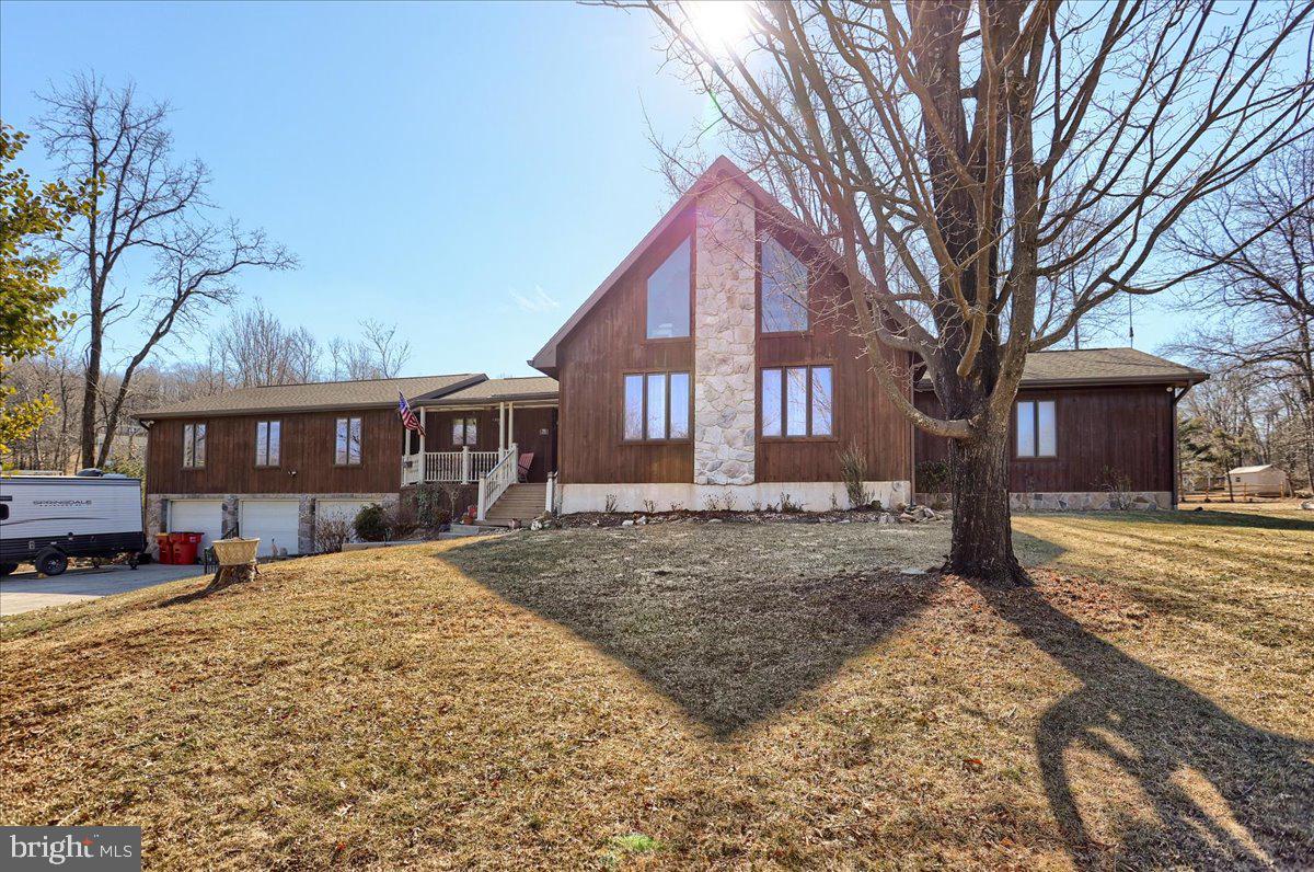 75 Thunder Trail Fairfield, PA 17320 - Photo 6 of 64 a front view of a house with a yard