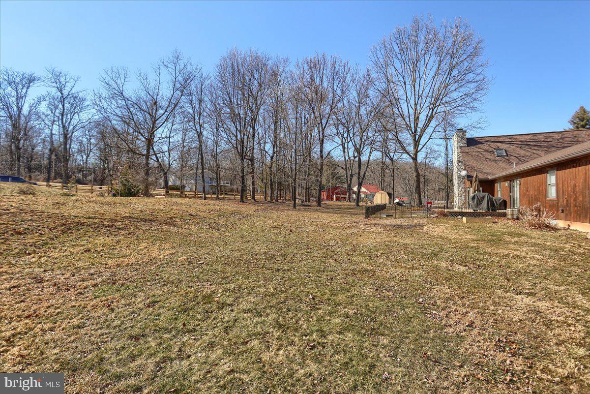 75 Thunder Trail Fairfield, PA 17320 - Photo 64 of 64 a backyard of a house with trees