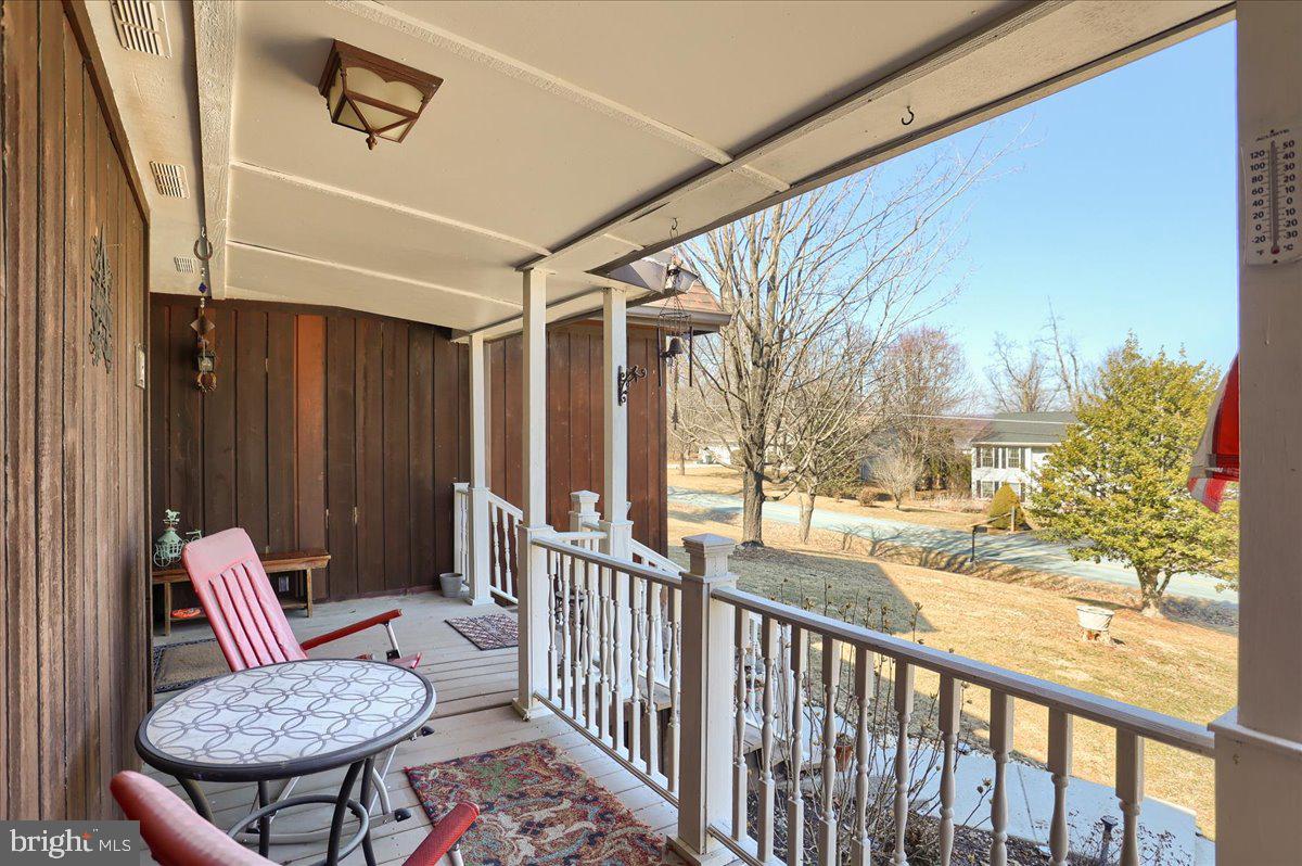75 Thunder Trail Fairfield, PA 17320 - Photo 7 of 64 a view of a chairs and table in the balcony