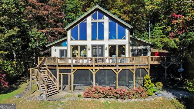 a front view of a house with yard