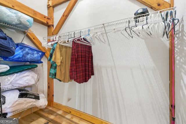 a bathroom with a toilet and shower