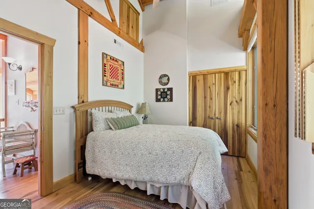 a view of a kitchen with kitchen island a sink and a stove