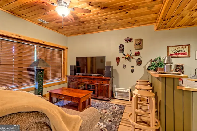 a view of a field with a tree