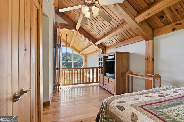 a kitchen with stainless steel appliances a stove a refrigerator and a sink