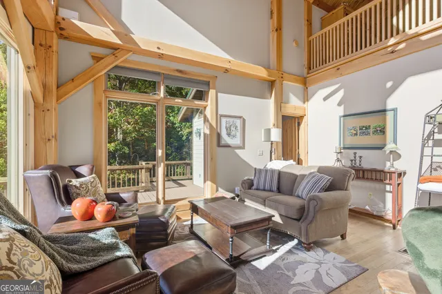 a view of a patio with wooden fence