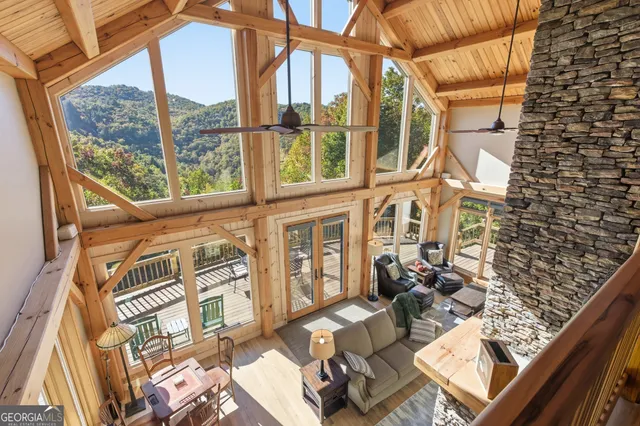 a room with pool table table and chairs