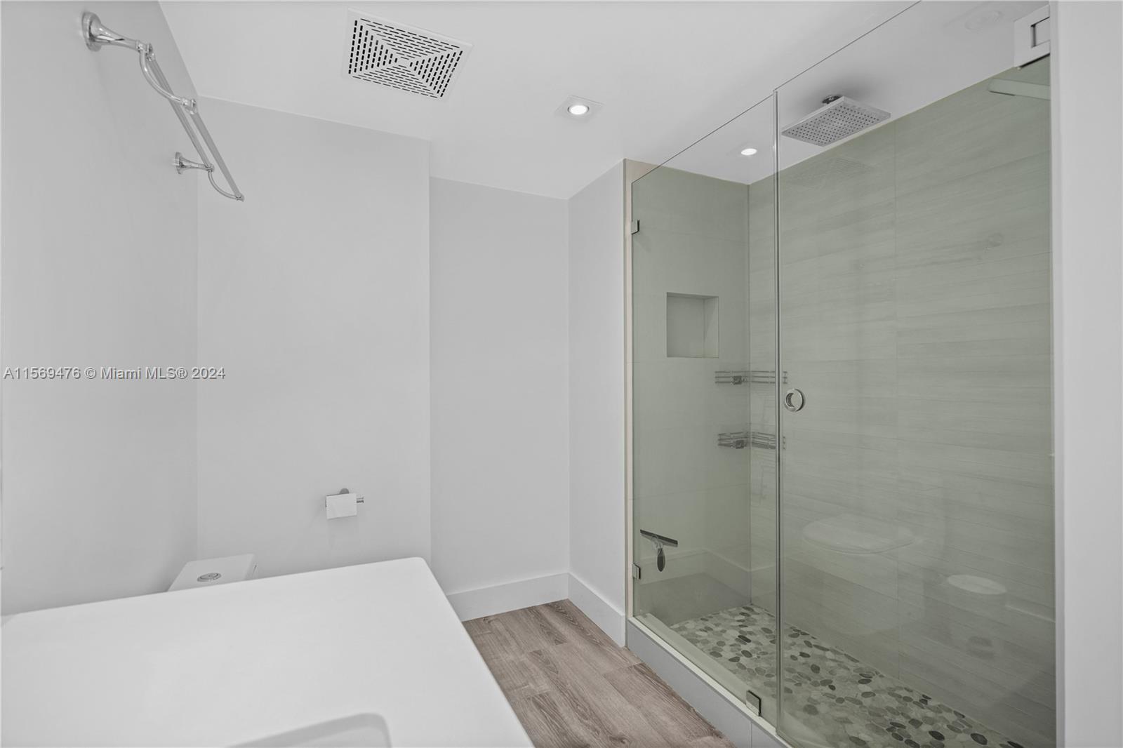 2101 Brickell Avenue, Unit 2012 Miami, FL 33129 - Photo 16 of 44 a bathroom with a bathtub and shower