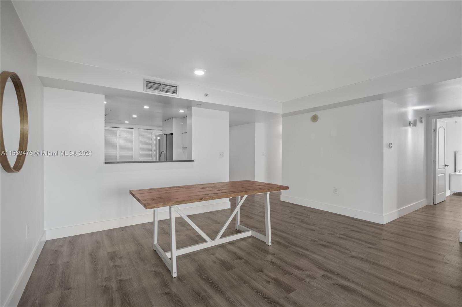 2101 Brickell Avenue, Unit 2012 Miami, FL 33129 - Photo 32 of 44 a room with furniture and wooden floor