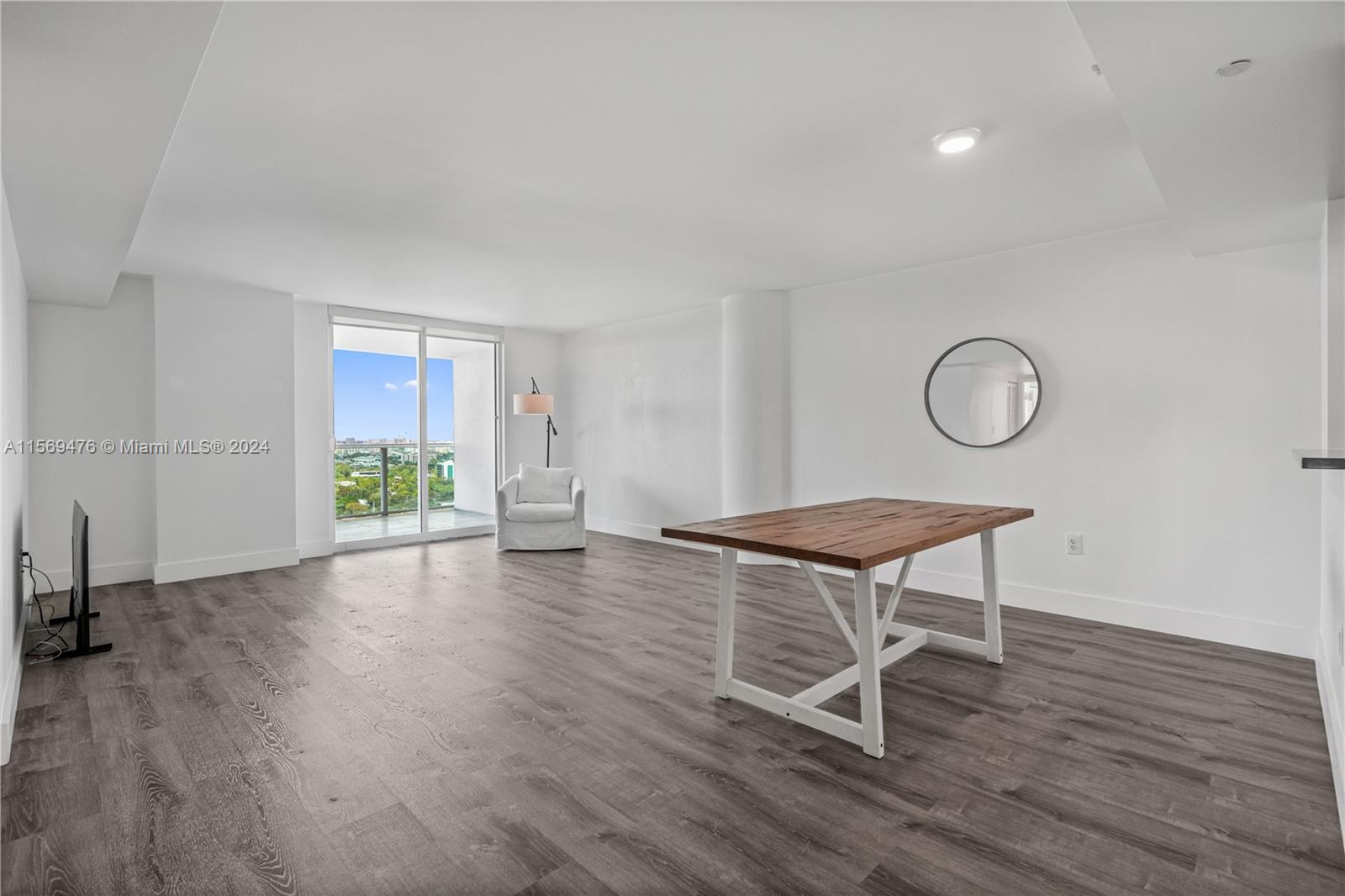 2101 Brickell Avenue, Unit 2012 Miami, FL 33129 - Photo 36 of 44 a view of a livingroom with furniture and wooden floor