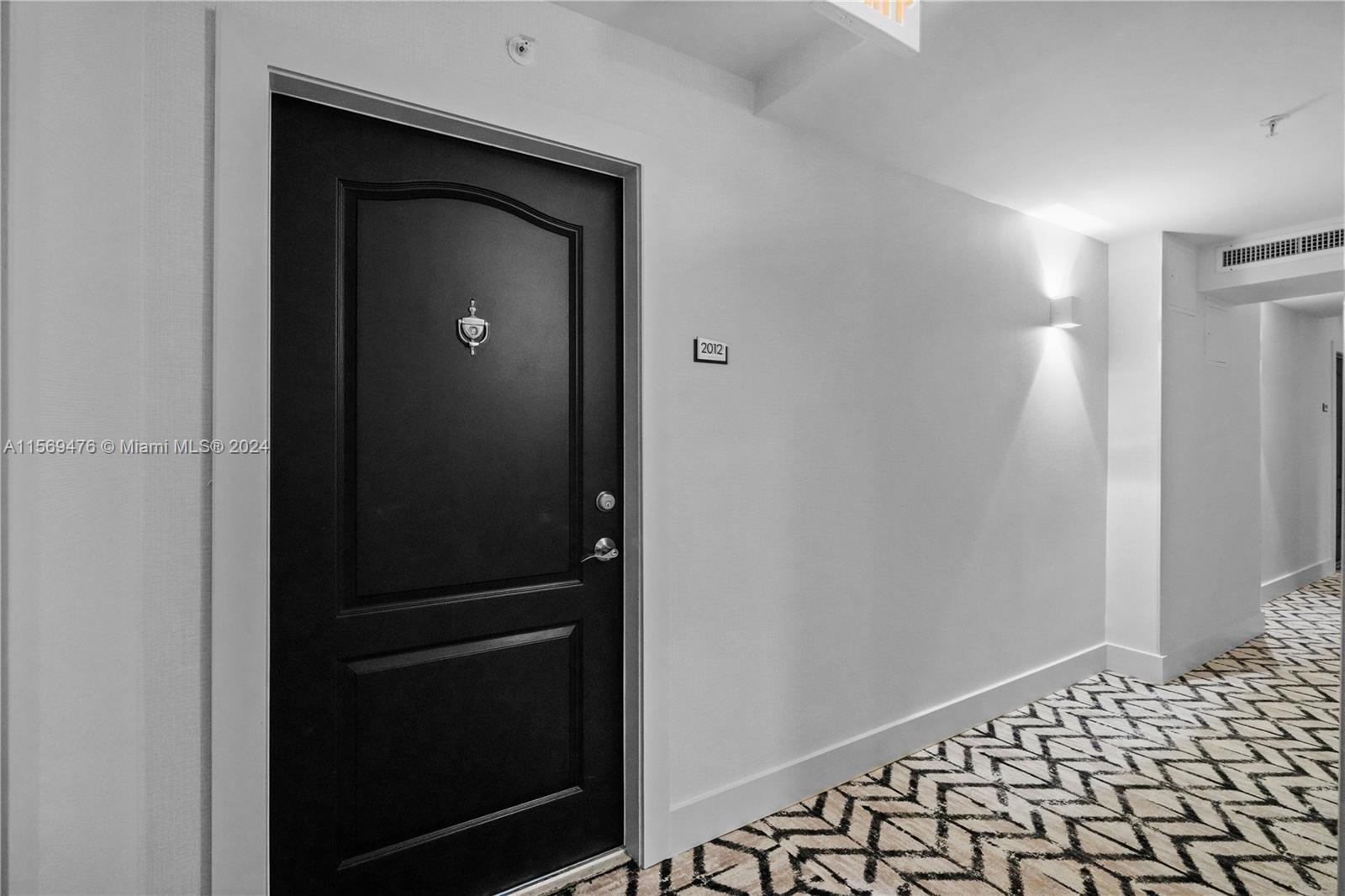 2101 Brickell Avenue, Unit 2012 Miami, FL 33129 - Photo 7 of 44 a view of a hallway