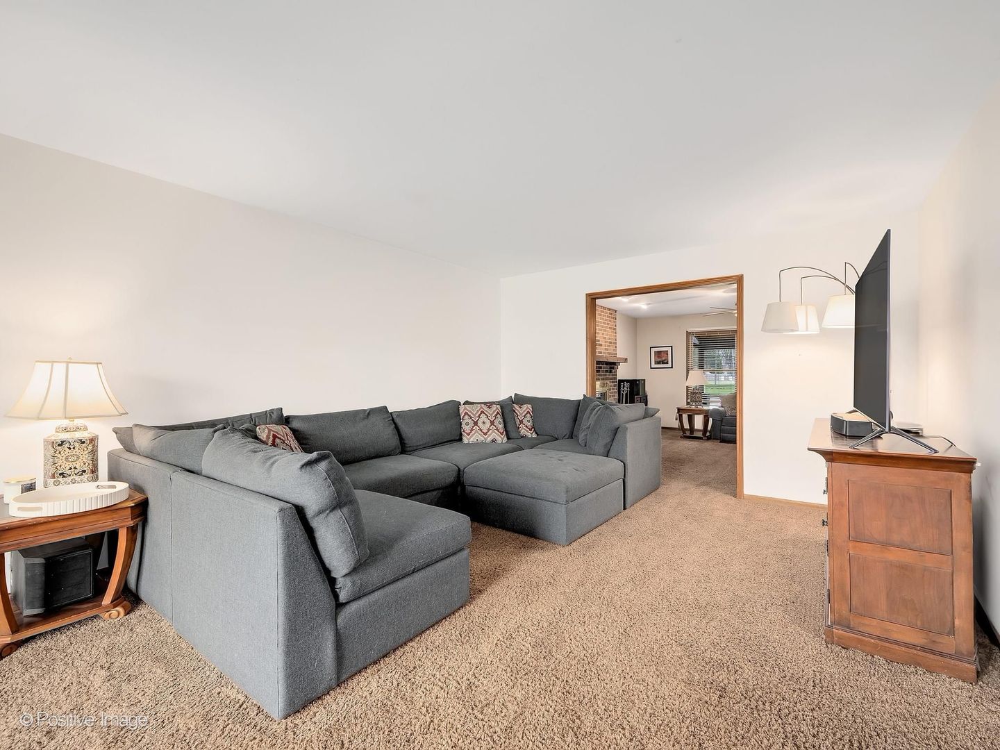 612 Stuart Drive Carol Stream, IL 60188 - Photo 4 of 29 a living room with furniture and a fireplace