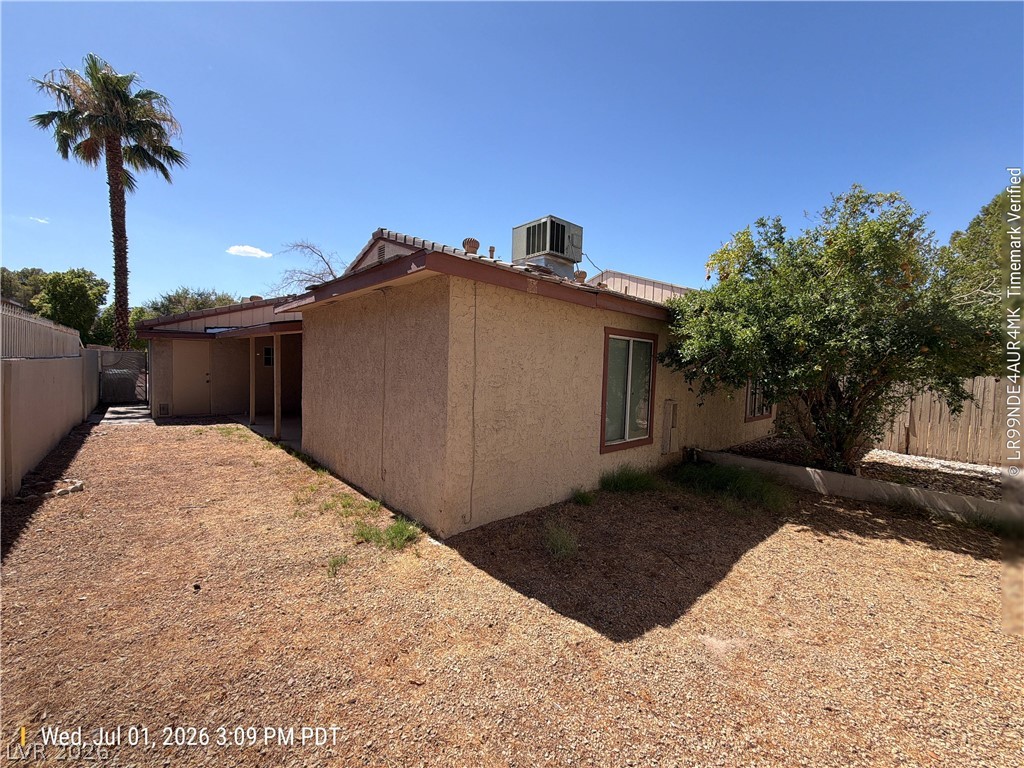 2313 Ragland Street Las Vegas, NV 89108 - Photo 11 of 11 A desert-friendly backyard provides a low-maintenance outdoor space with ample room for relaxation.